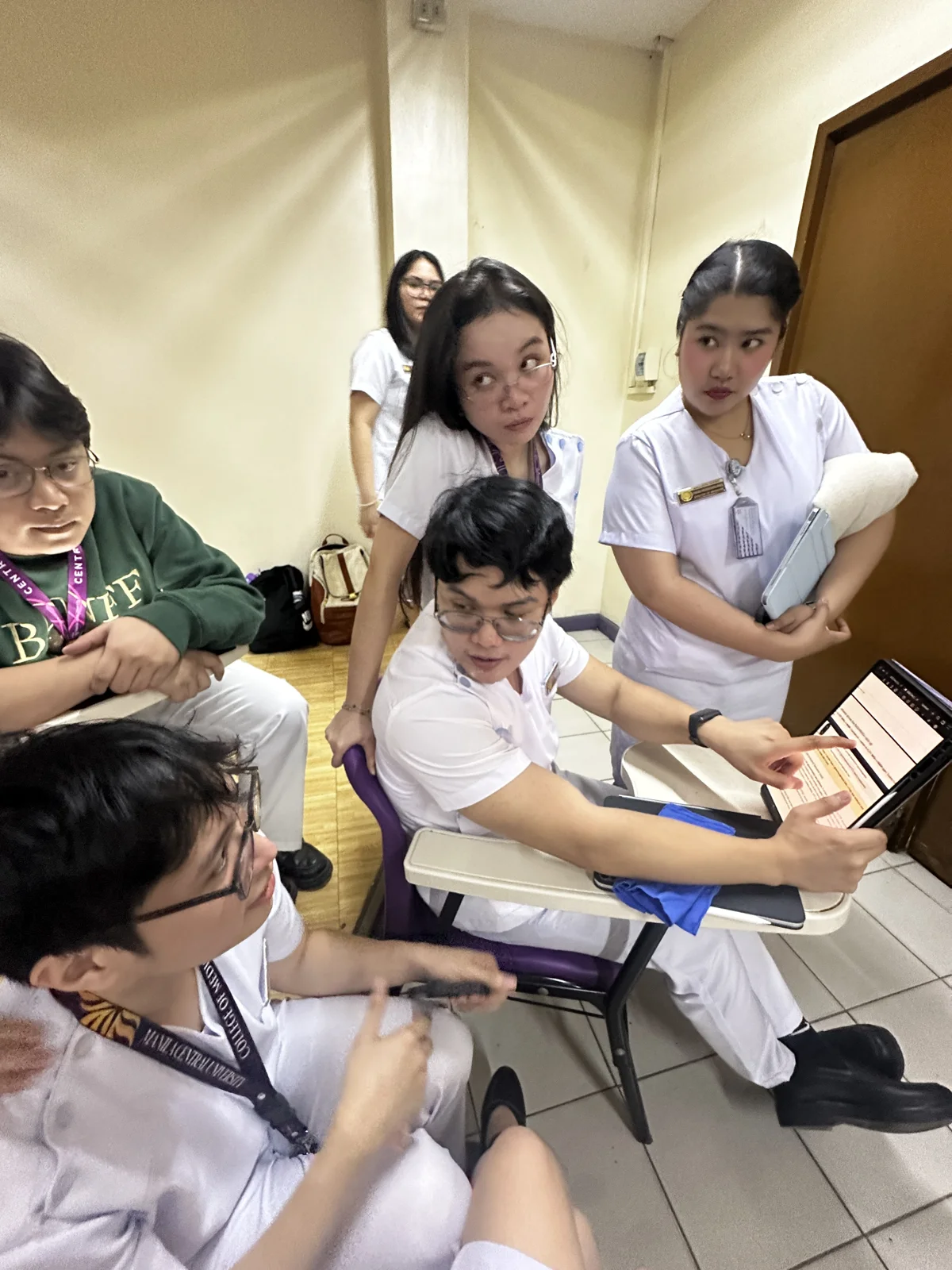 Reviewing together with my friends, with Jake taking the time to teach us before the SGD quizzes.